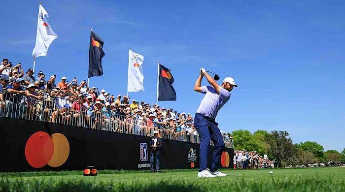 Scottie Scheffler hits a tee shot on the first hole during the final round of the 2024 Arnold Palmer Invitational at Bay Hill Golf Course in Orlando, Fla.